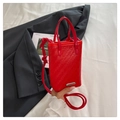 Minimalist red woven crossbody mini bag with silver metal trim and shoulder strap - Red