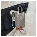 Chic silver woven leather mini shoulder bag with metallic accent on white fabric - Silver