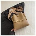 Detail of khaki bucket bag with lychee texture leather and stylish acrylic chain strap - Dark Khaki
