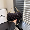 Elegant black velvet evening clutch with diamond lattice patterns and gold metal handle - Black