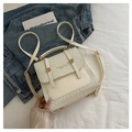Mini sac à dos crème chic avec détails en cuir tressé et garnitures dorées élégantes - Blanc