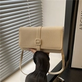 Sac bandoulière minimaliste en toile beige avec bride à boucle et texture élégante - Beige