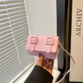 Mini pink crossbody bag in premium PU leather with elegant double buckle flap design - Pink