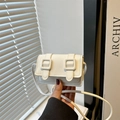 Mini minimalist square white crossbody bag with decorative buckles and fine shoulder strap - White