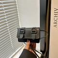 Minimalist black matte leather small square crossbody bag with double buckle straps - Black