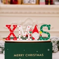Scritta XMAS in legno con Babbo Natale su scatola regalo verde Merry Christmas - Stile XMAS Babbo Natale