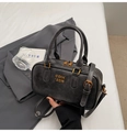 Detailed shot of dark grey Boston bag with gold logo and adjustable shoulder strap - Black (Without Charm)