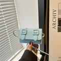 Minimalist light blue mini crossbody bag featuring dual belt strap decorations - Blue