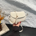Minimalist cream white crossbody saddle bag with smooth leather finish and gold metal buckle - White