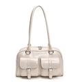 Macro detail of creamy white shoulder bag with two front pockets and silver buckles - White