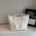 Minimalist white woven tote bag with shoulder strap and RSKE PARIS brand label - Off-white