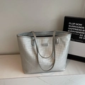 Silver woven tote bag with metallic finish and top handles for a stylish commute look - Silver