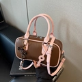Brown leather Boston bag with pink handles and a stylish key pendant detail - Brown & Pink (With Pendant)