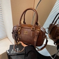 Retro dark brown matte Boston bag with gold COIH '2DN lettering and charms - Brown (With Pendant)