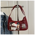 Red leather ita bag featuring a clear window with a cute white plush bear and bow charms - Red