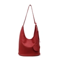 Vibrant red lychee leather hobo bucket bag with sleek shoulder strap and round charm - Burgundy