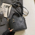 Classic black embossed leather bucket bag with gold hardware and star patterns - Black - Without Pendant