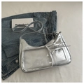 Close-up of metallic silver shoulder bag with clear PVC window and ribbon detail - Silver