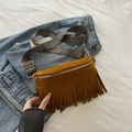 Ginger yellow suede fringe crossbody bag with retro patterned woven shoulder strap - Brown