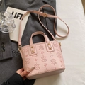 Pink embossed bucket bag with star patterns and adjustable shoulder strap for women - Pink - No Pendant
