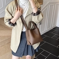 Minimalist dark brown lychee leather bucket bag for women with cross-body strap - Coffee