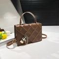 Classic coffee brown quilted crossbody bag with golden chain lock and top handle - Brown