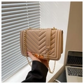 Close-up of beige chevron quilted shoulder bag with gold twist lock and chain strap - Khaki