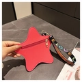 Close-up of a pink star-shaped leather coin purse with LOVE ribbon and heart zipper - Rose Pink