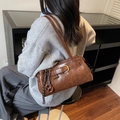 Retro brown faux leather underarm bag with decorative belt and twisted rope charm - With Pendant / Brown