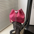 Hot pink crocodile textured bucket bag with silver butterfly buckle and pearl drawstring - Rose Pink