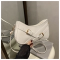 White faux leather crescent underarm bag with crocodile pattern and gold buckle detail - White