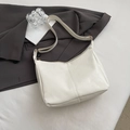 Minimalist white PU leather crossbody tote bag with adjustable strap and flat crescent shape - White