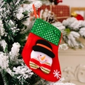 Weihnachtsstrumpf mit Schneemann-Motiv und grünen Pailletten für die Deko - Schneemann