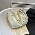 Bolso de hombro verde claro de tela texturizada con lazos negros y asas de cuerda - Verde