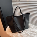 Minimalist black leather tote bag with long straps for women's office commuting style - Black