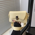 Pale yellow minimalist flap shoulder bag with matte leather and metal twist lock - Yellow