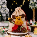 Linen Christmas gift bag featuring a 3D reindeer plush doll and red drawstring closure - Elk