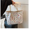 Elegante borsa tote crema con stampe cartoon, catena dorata e ciondolo di perle bianche - Bianco