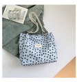 Light blue quilted tote bag with black bow prints and white leather shoulder straps - Without Pendant / Blue