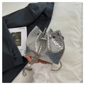 Silver metallic embossed bucket bag with chain strap and pearl drawstring detail - Silver