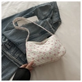 Dettaglio borsa jacquard floreale con fiocchi rosa e finitura in tessuto a rilievo - Bianco