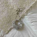 Mini bolso de mano esférico en metal plateado con cadena larga y diseño calado - Plateado