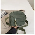 Bolso bandolera de pana verde oscuro para mujer con detalle de cremallera trenzada - Verde