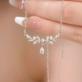 Silver wheat necklace with sparkling leaf motif and a pear-shaped zircon pendant - Laurel Goddess Necklace
