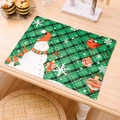 Christmas snowman and green plaid placemat with festive snowflake patterns on a wooden table - Red Green Plaid Snowflake Cartoon Placemat Green Snowman