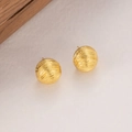 Detailed macro view of gold-plated spherical earrings featuring a textured wavy pattern - Gold Round Ball Textured Stud Earrings / Gold