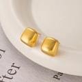 Macro detail of geometric square stud earrings with matte brushed gold finish texture - Brushed Gold (Silver Pin)