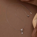 Collana a farfalla in acciaio inossidabile argentato con zirconi e catena regolabile - Argento