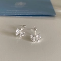 Boucles d'oreilles nœud élégantes avec zircons étincelants en finition argentée - Clou d'oreille nœud en zircone