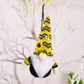 Gnome ornament with yellow bee stripes and sunflower detail on knitted hat - Striped Hat Style